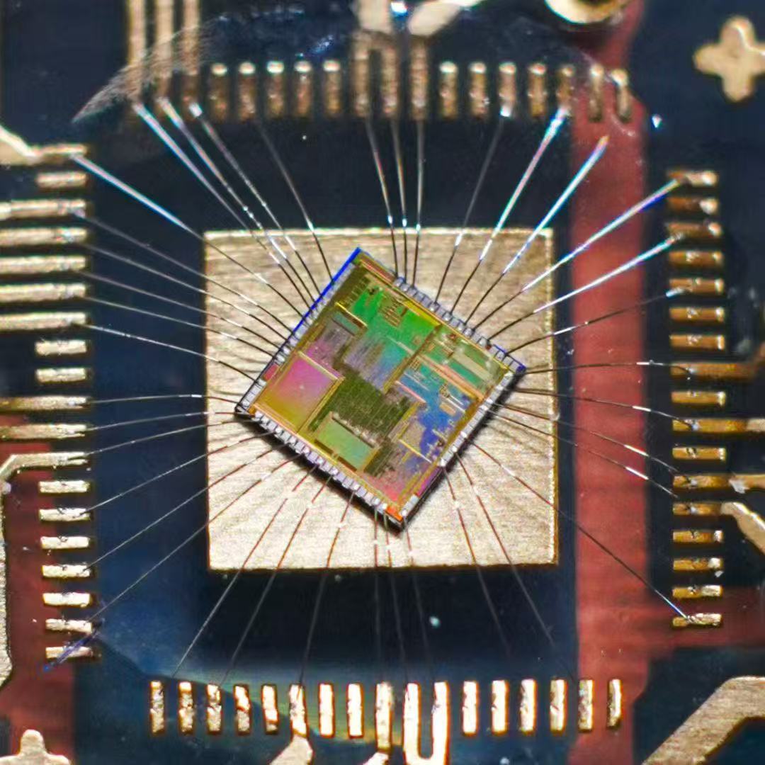 Mobile application development interface on computer screen, showing app design tools and code editor, representing professional software development services